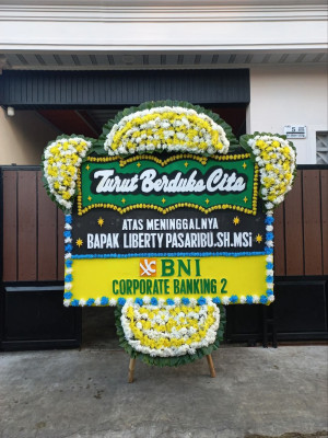 Papan Bunga Duka di Paminggir