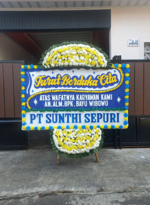 Papan Bunga Duka di Paminggir