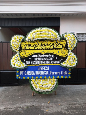Papan Bunga Duka di Paminggir