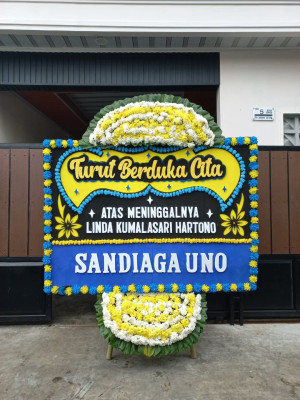 Papan Bunga Duka di Paminggir